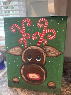 Reindeer face green background